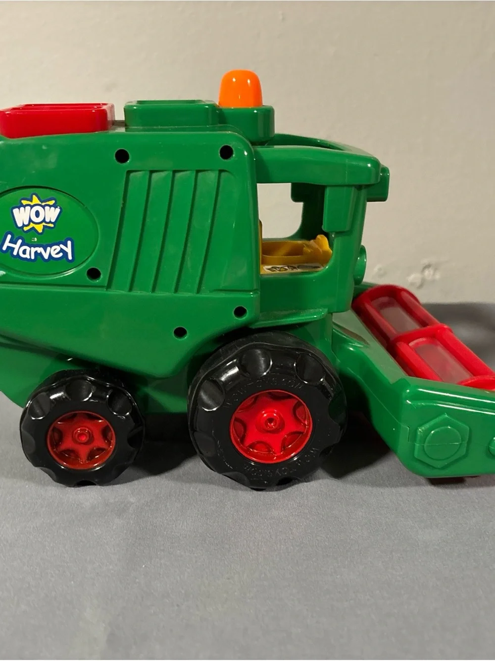 Green Farm Combine Toy with Red Accents